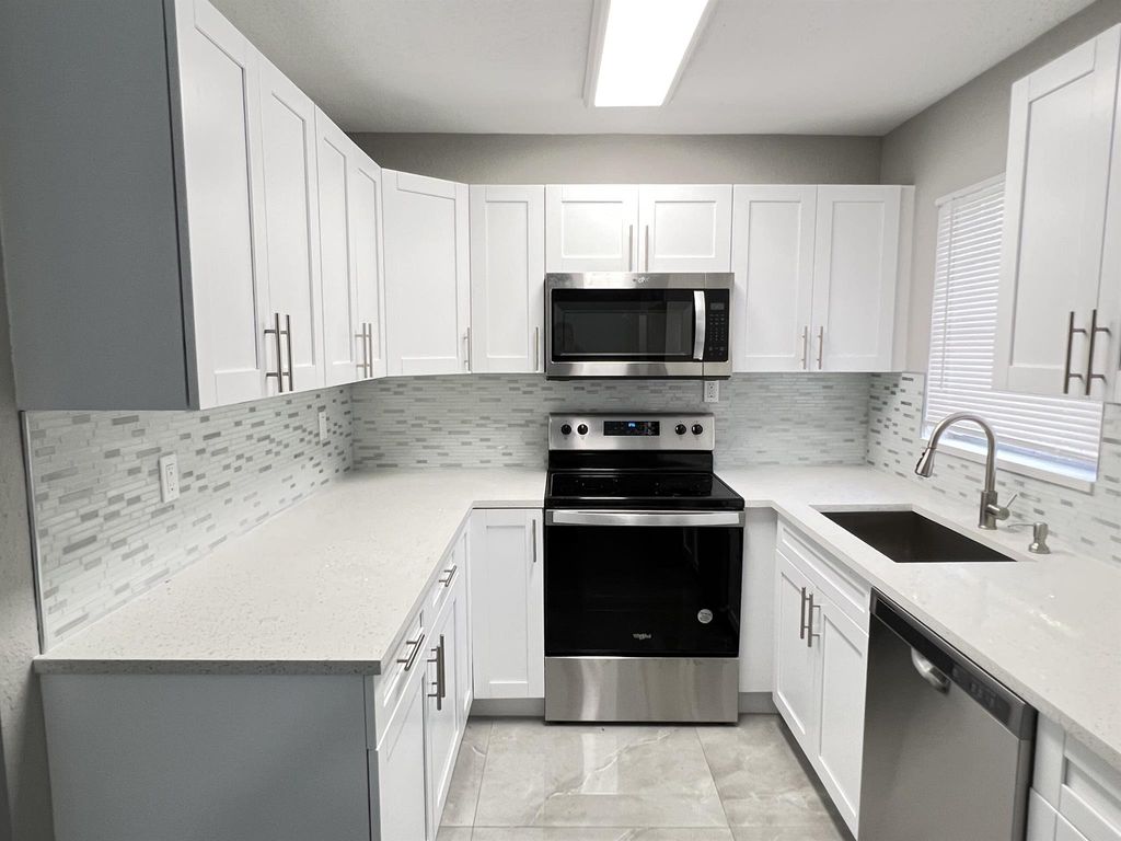 Photo of 4696 Collier Road, Lake Worth, FL 33463 (MLS # R11115847)