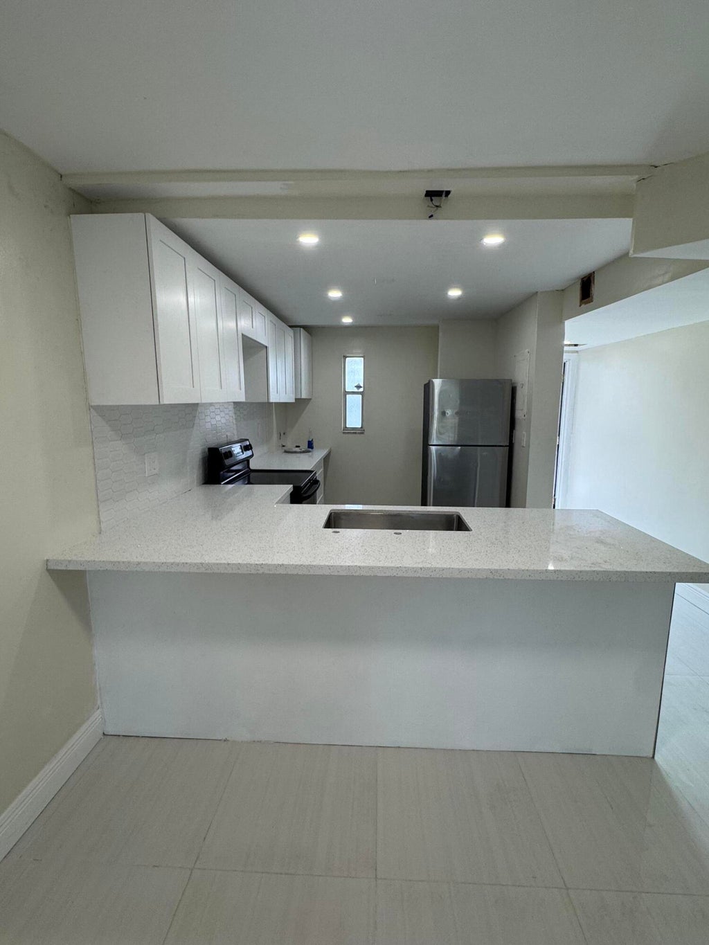 Photo of 8000 FAIRVIEW Drive #209, Tamarac, FL 33321 (MLS # B26073005)