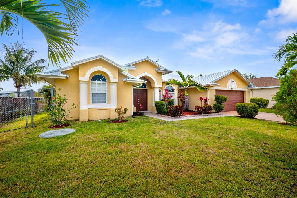 Photo of 2466 SW Lafayette Street, Port Saint Lucie, FL 34984 (MLS # R11087620)