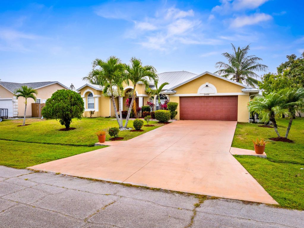 Photo of 2466 SW Lafayette Street, Port Saint Lucie, FL 34984 (MLS # R11087620)