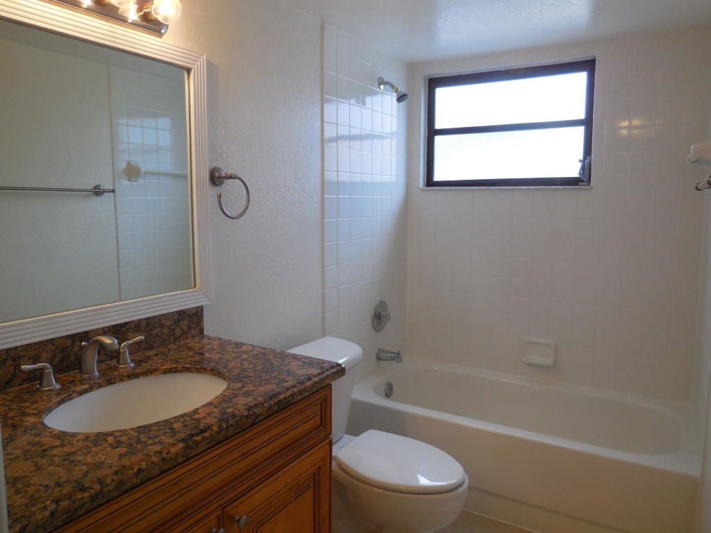 Photo of 1500 Windorah Way #D, West Palm Beach, FL 33411 (MLS # B26027679)