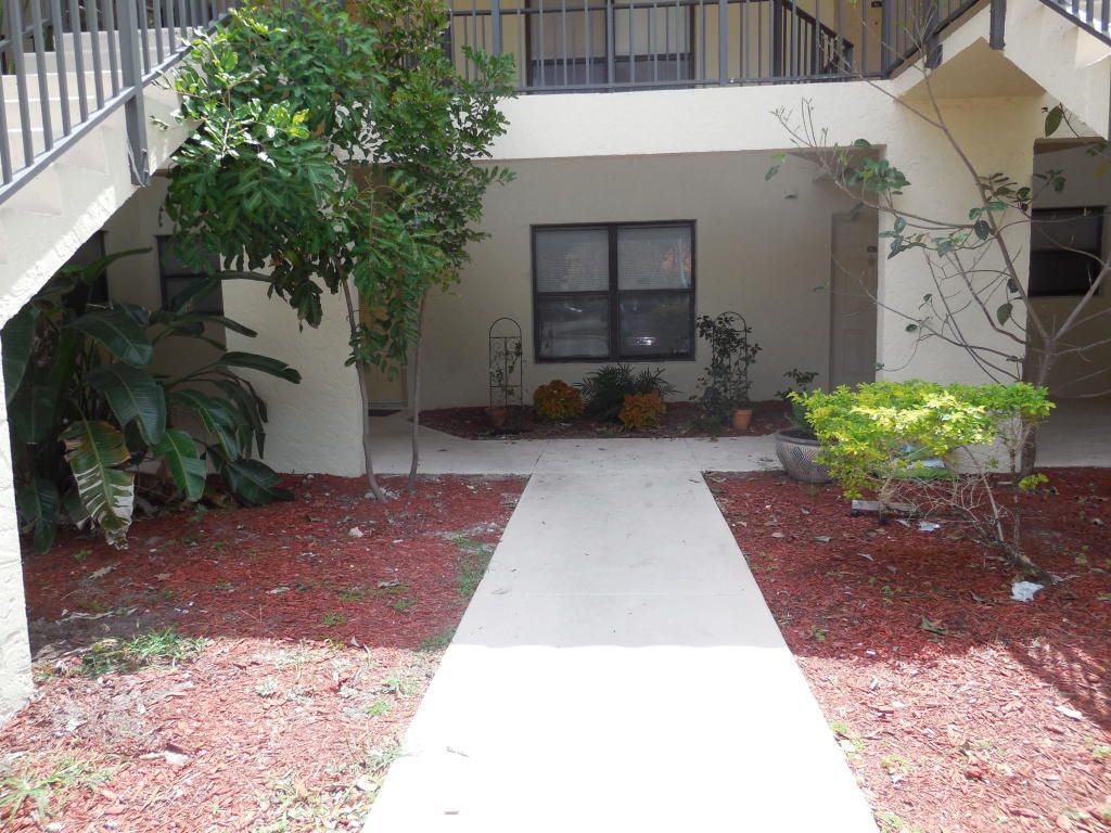 Photo of 1500 Windorah Way #D, West Palm Beach, FL 33411 (MLS # B26027679)