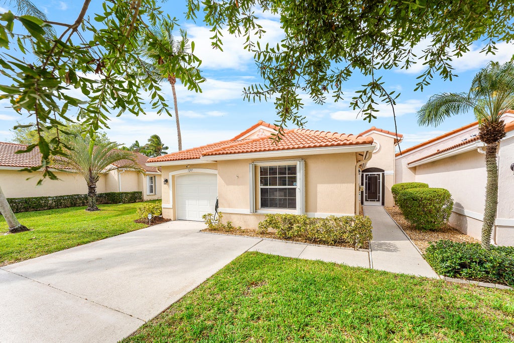 Photo of 7297 Burgess Drive, Lake Worth, FL 33467 (MLS # R11140023)