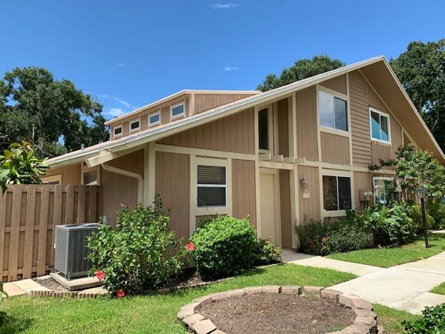 WOW Four bedrooms, three bath townhome in the heart of Jupiter for under $300,000!  This two story townhome also features a large loft,  private enclosed fenced in patio, two assigned parking spaces, stainless steel appliances and granite countertops in kitchen.  The roof was replaced this year and the hot water heater last year.  This home backs up to preserve making it very private.   Master bedroom/bathroom and one guest bedroom and full bathroom on the first floor.  On the second floor is the loft, two bedrooms and one full bath. Call today to schedule a showing!