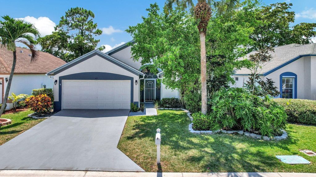 Photo of 412 Trotters Lane, Greenacres, FL 33413 (MLS # R10994216)