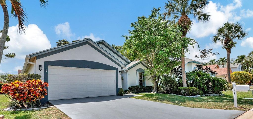Photo of 412 Trotters Lane, Greenacres, FL 33413 (MLS # R10994216)