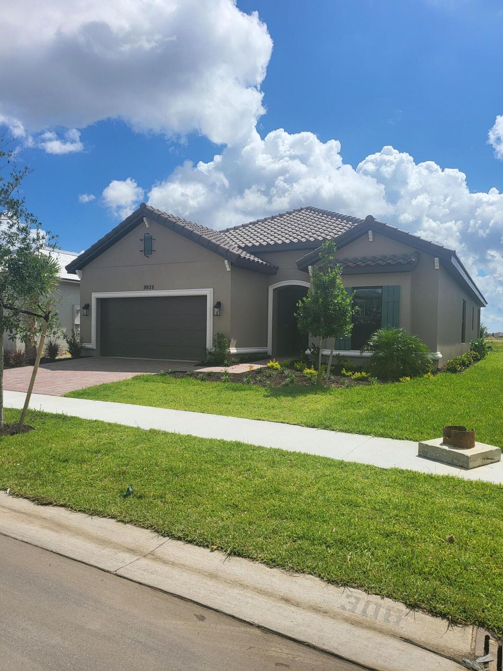 Photo of 9935 SW Cloister Drive, Port Saint Lucie, FL 34987 (MLS # R11153631)