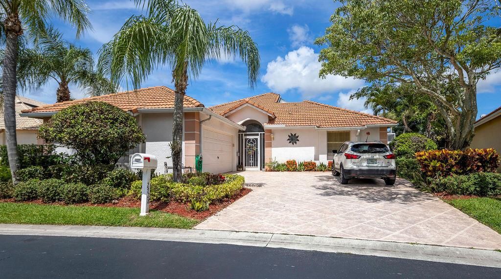 Photo of 2728 Pointe Circle Cir, Greenacres, FL 33413 (MLS # R10814042)