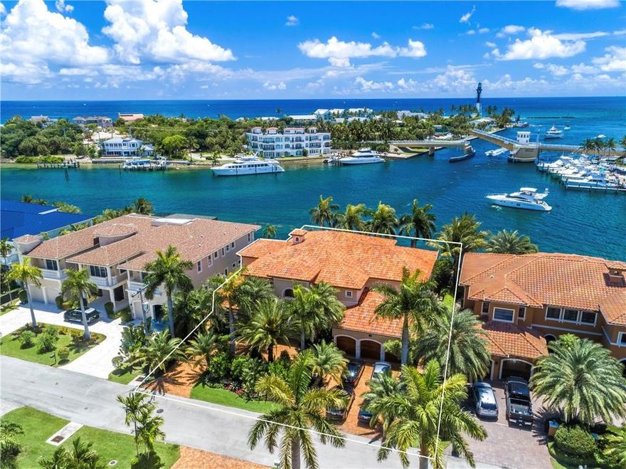 Set in one of the most desirable locations in Lighthouse Point. Designed in Mediterranean style, enter the grand foyer with its tropical feel and you are drawn to one of the most amazing views of the Intracoastal the Lighthouse Point inlet and ocean. Chef's kitchen with adjacent family room, formal dining room, downstairs master bedroom suite with fabulous water views. The upstairs features four additional suites with entertainment area, large balcony ,amazing water views. The indoor/outdoor living space provide the sophisticated yet informal lifestyle that is the essence of Lighthouse Point. A 100 foot dock, heated pool, summer kitchen, tropical landscape grounds. Ocean views, turquoise water and hundreds of exotic fish at the foot of your dock make this a unique and trophy location.