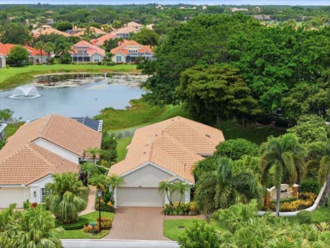 Photo of 740 Pinehurst Way, Palm Beach Gardens, FL 33418 (MLS # B26053600)