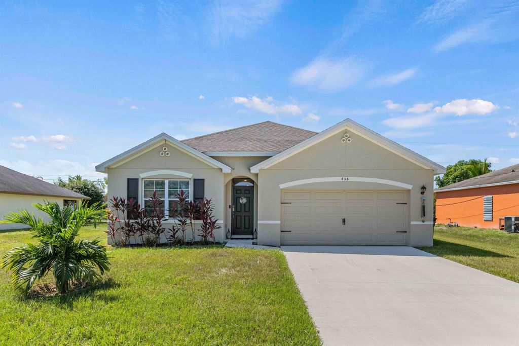 Photo of 458 SW Laconic Avenue, Port St Lucie, FL 34953 (MLS # R10917908)