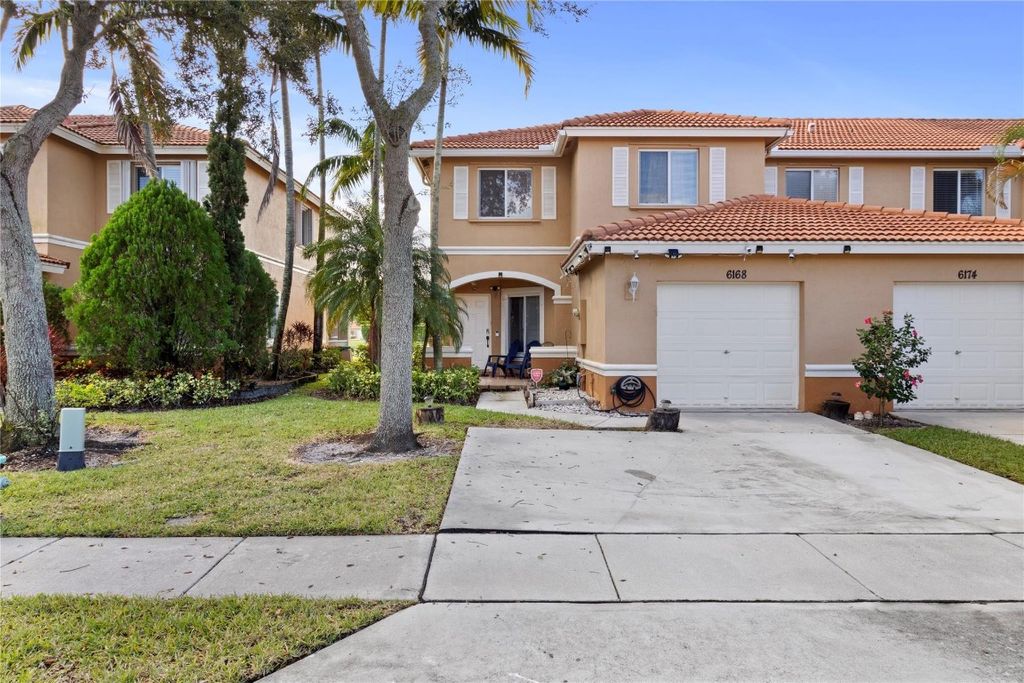 Photo of 6168 Reynolds Street #6168, Royal Palm Beach, FL 33411 (MLS # F10408263)