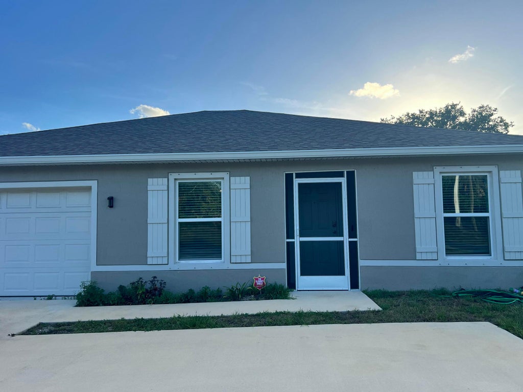 Photo of 3882 SW Darwin Boulevard, Port Saint Lucie, FL 34953 (MLS # B26037747)