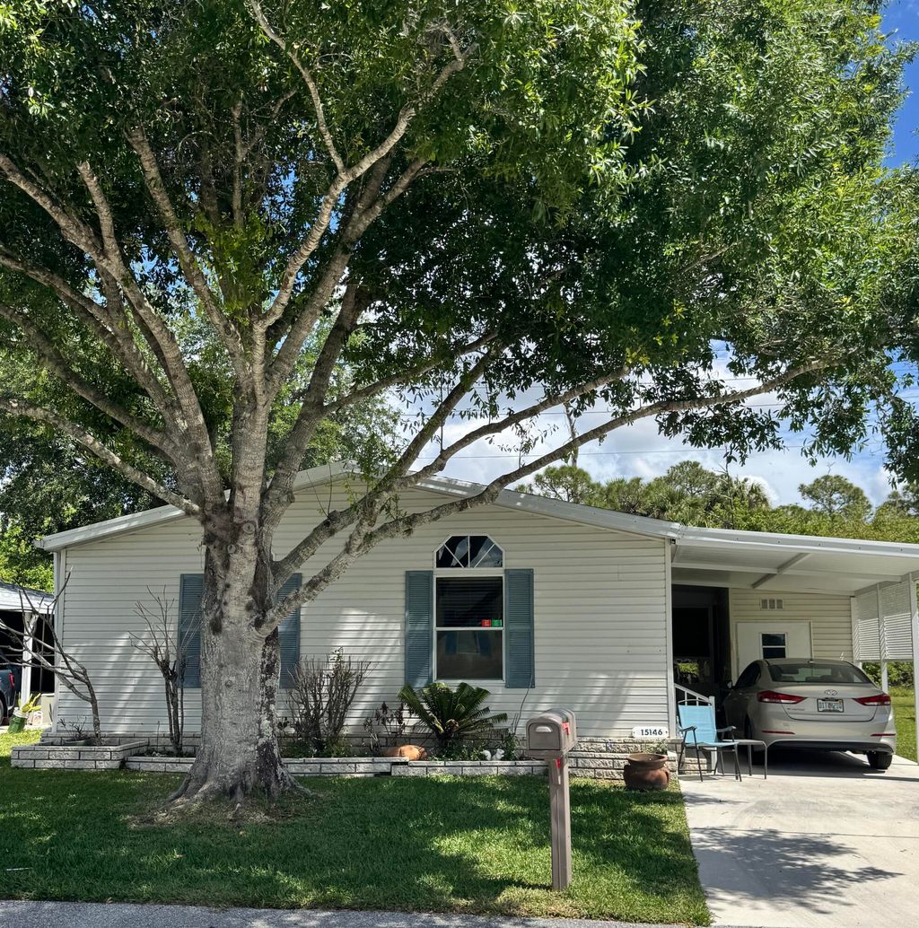 Photo of 15146 Aguila Avenue, Fort Pierce, FL 34951 (MLS # B26022399)