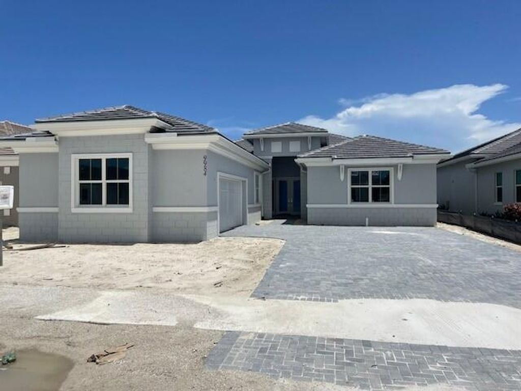 Photo of 9984 Seagrass Way, Palm Beach Gardens, FL 33412 (MLS # R10916506)