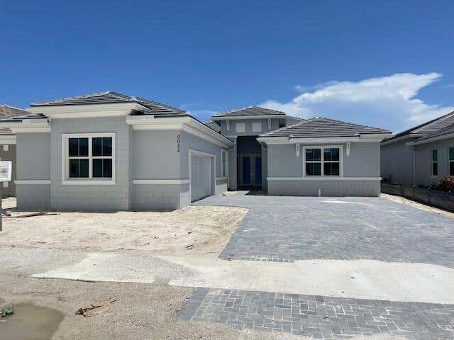 Photo of 9984 Seagrass Way, Palm Beach Gardens, FL 33412 (MLS # R10916506)