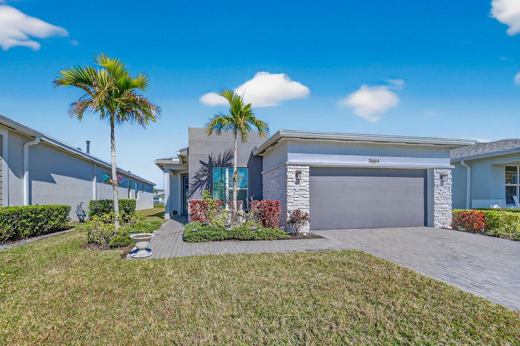 Photo of 11684 SW Lyra Drive, Port Saint Lucie, FL 34987 (MLS # R11160302)