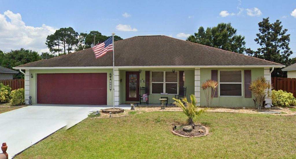 Photo of 1874 SW Capehart Avenue, Port Saint Lucie, FL 34953 (MLS # F10550474)