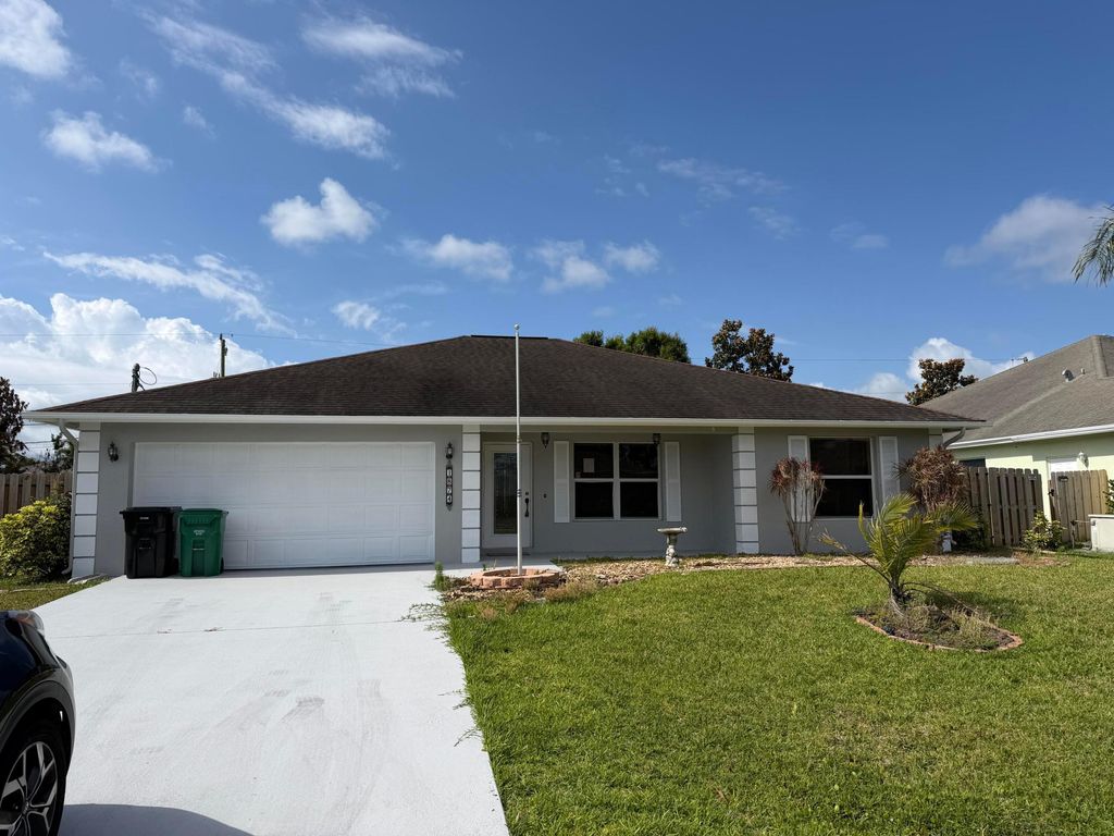 Photo of 1874 SW Capehart Avenue, Port Saint Lucie, FL 34953 (MLS # F10550474)