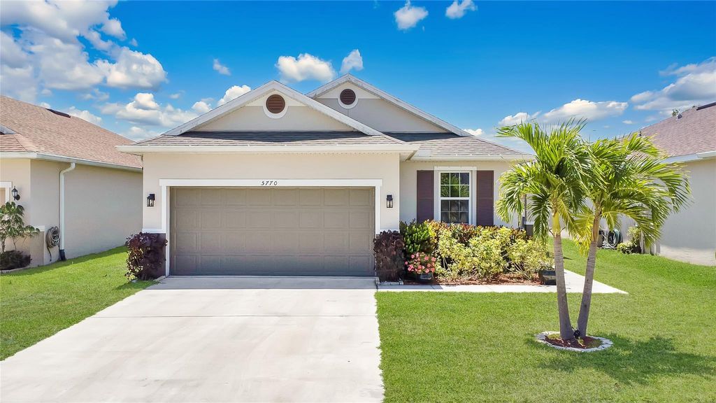 Photo of 5770 NW Pine Trail Circle, Port Saint Lucie, FL 34983 (MLS # F10498867)