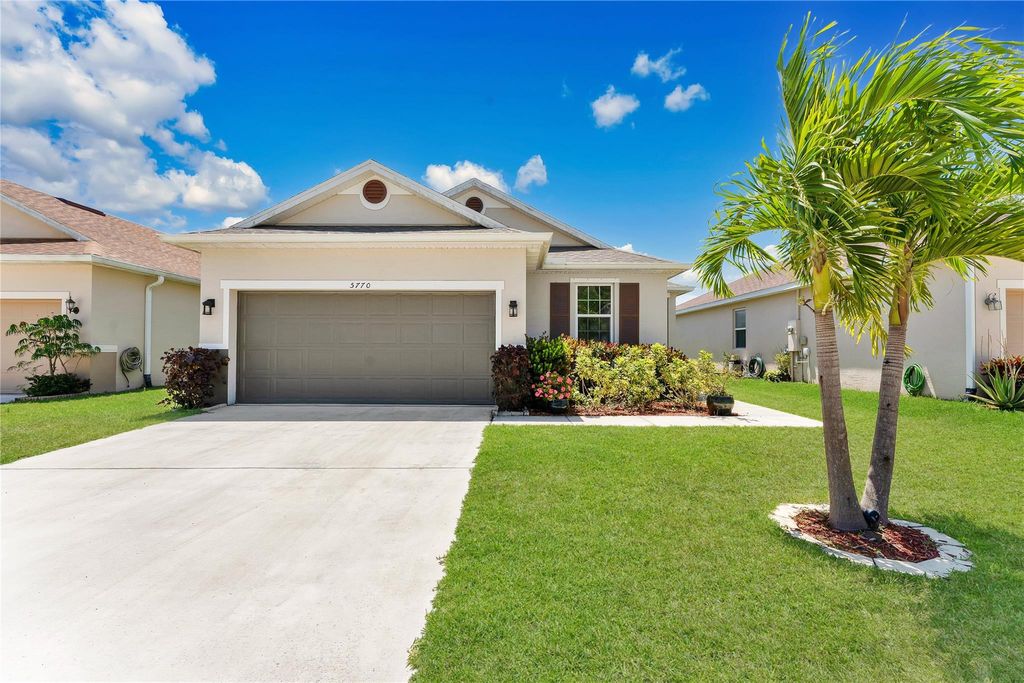 Photo of 5770 NW Pine Trail Circle, Port Saint Lucie, FL 34983 (MLS # F10498867)