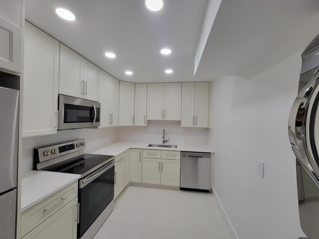 Photo of 733 SE 1st Way #303, Deerfield Beach, FL 33441 (MLS # R11125796)