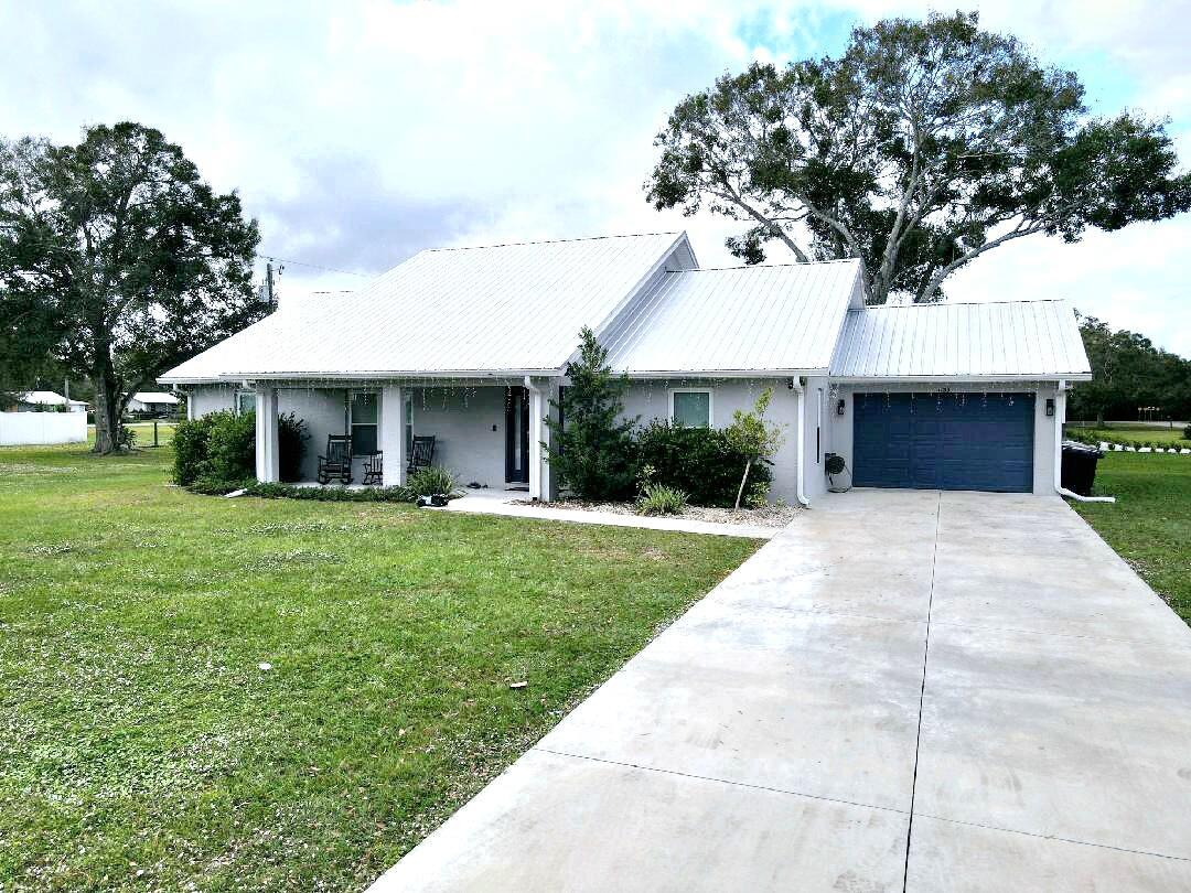 Gorgeous, 3 Bedroom 2 Bathroom 1 car garage custom built CBS home with a metal roof. This exquisite home built in 2021 will surely impress with all of the quality details such as vaulted ceilings, beautiful trim work and impact windows. The open floor plan is great for entertaining. The master has an ensuite bathroom that features a walk-in closet, a large, tiled shower and separate soaking tub. Outside the back patio is ready for entertaining, large concrete driveway in front and a corner lot provides lots of room.