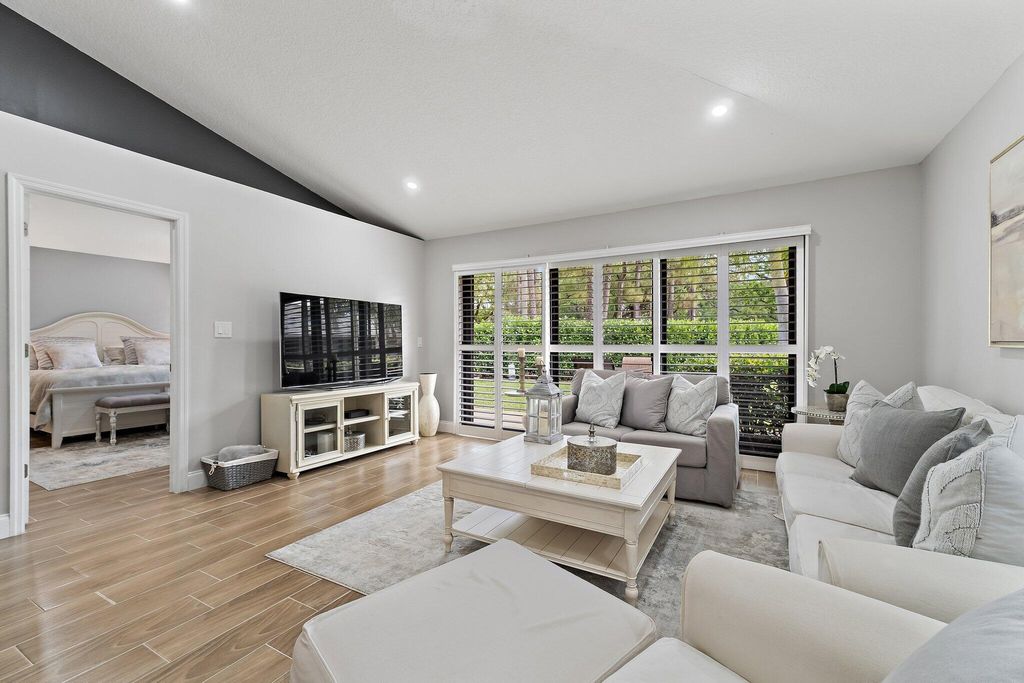 Photo of 834 Club Drive, Palm Beach Gardens, FL 33418 (MLS # B26019392)