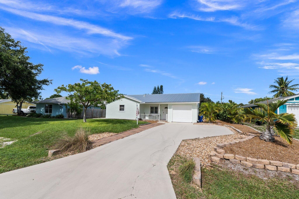 Photo of 1685 NE Darlich Avenue, Jensen Beach, FL 34957 (MLS # R10999730)