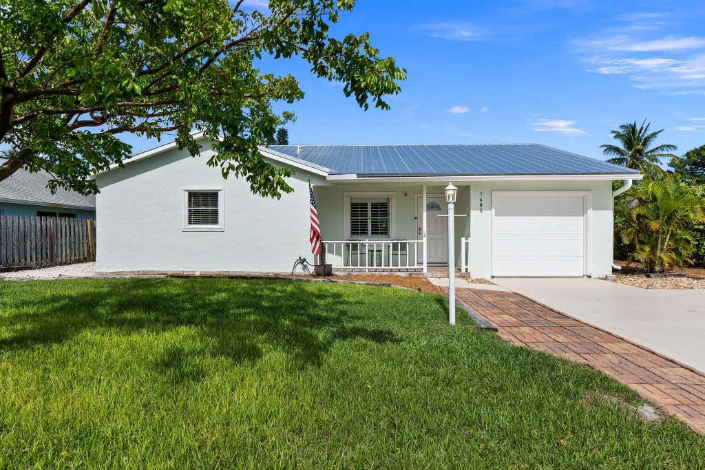 Photo of 1685 NE Darlich Avenue, Jensen Beach, FL 34957 (MLS # R10999730)