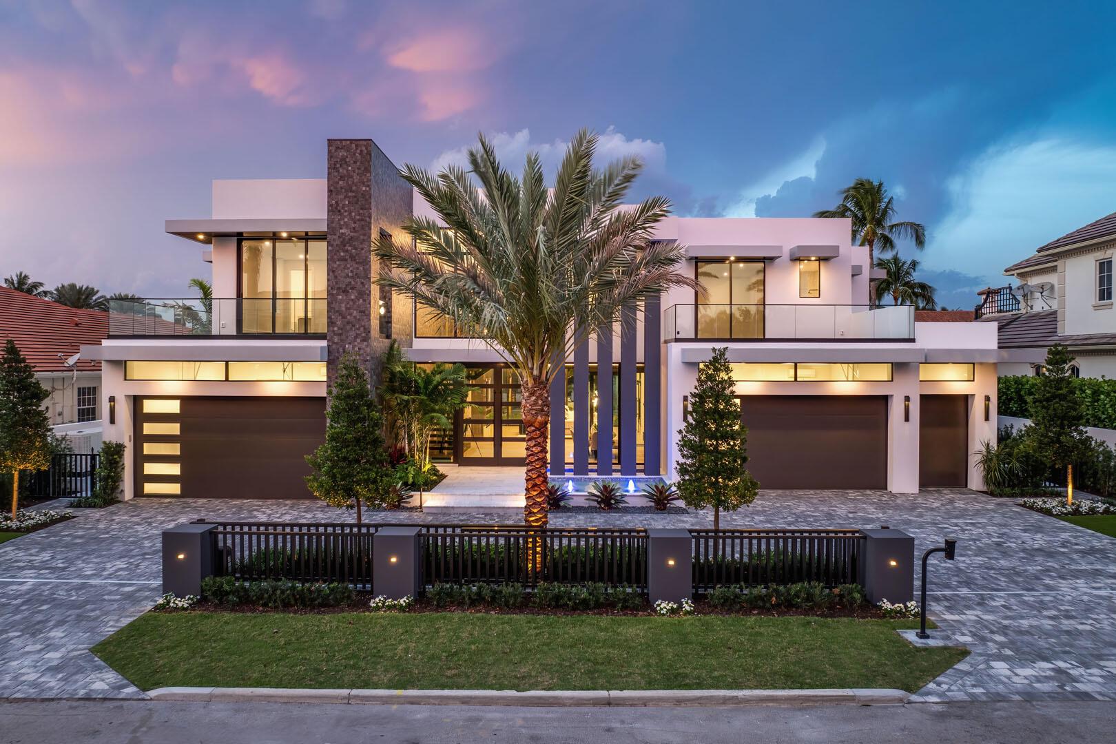 Discover a brand-new smart home crafted by Hanna Homes within the prestigious Royal Palm Yacht & Country Club! This custom estate is offered turn-key and fully furnished by Brown Interiors Design Group. With 6-bedrooms spanning over 9,500 square feet of luxurious living space, it seamlessly blends grandeur with the comfort of waterfront living. The property's centerpiece is a resort-style pool with a spa and sun shelf. The pool is complemented by an expansive covered loggia featuring a summer room and a fully equipped outdoor kitchen, perfect for entertaining or serene relaxation. Every element of this home is crafted for ultimate refinement, from the fully automated Crestron smart-home system to the state-of-the-art security features.