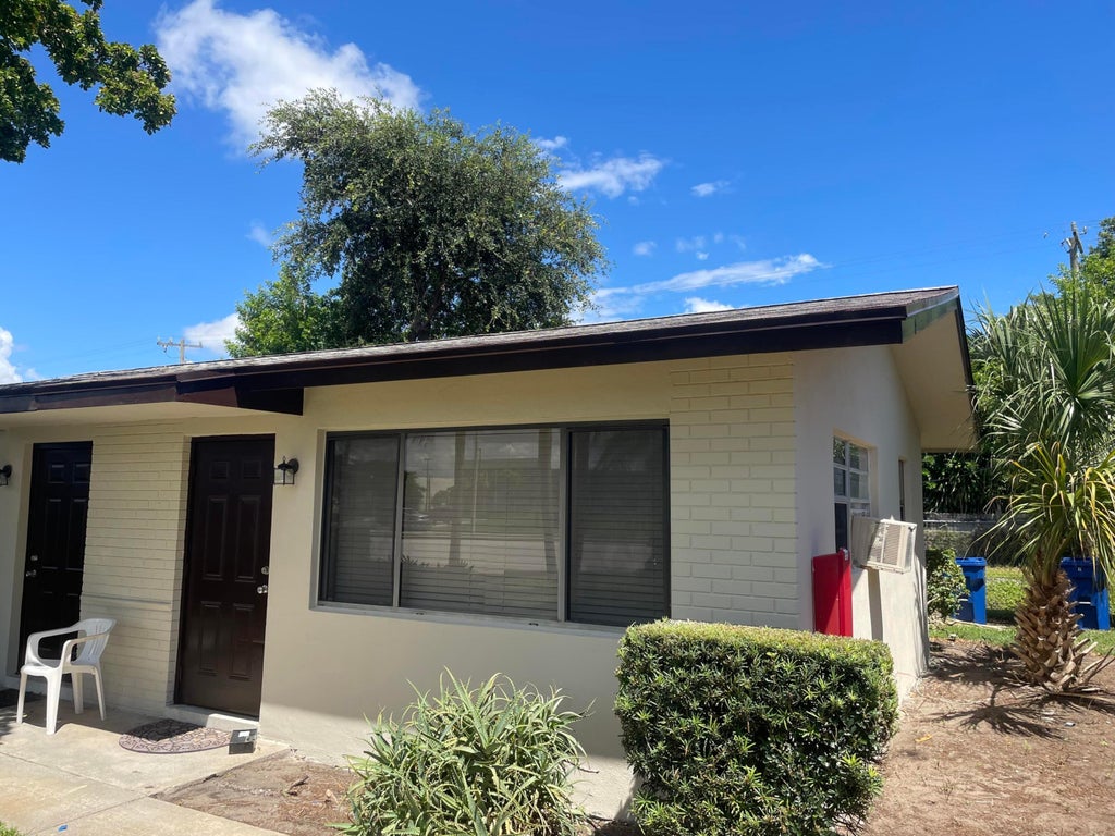 Photo of 1150 W Blue Heron Boulevard, Riviera Beach, FL 33404 (MLS # B26074711)