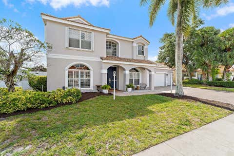Photo of 10295 Allamanda Boulevard, Palm Beach Gardens, FL 33410 (MLS # B26028163)