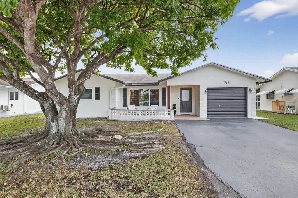 Photo of 7101 NW 98th Terrace, Tamarac, FL 33321 (MLS # R11156741)
