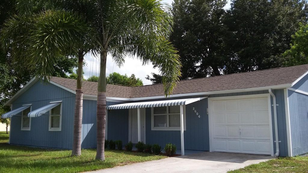 Photo of 2604 SW Ann Arbor Road, Port Saint Lucie, FL 34953 (MLS # R10976987)
