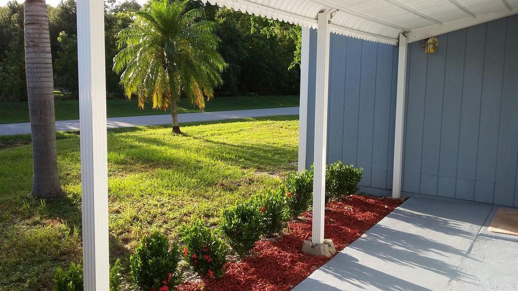 Photo of 2604 SW Ann Arbor Road, Port Saint Lucie, FL 34953 (MLS # R10976987)