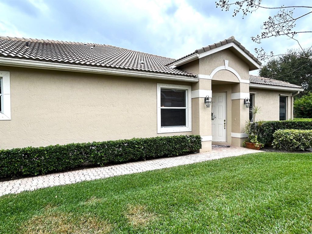 Photo of 9509 Crooked Stick Lane, Port Saint Lucie, FL 34986 (MLS # R10948992)