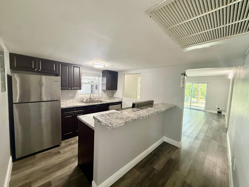 Photo of 726 SW 81st Avenue #14A, North Lauderdale, FL 33068 (MLS # B26068483)