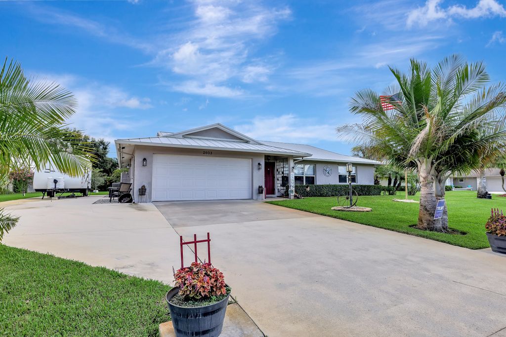 Photo of 2033 SE Allamanda Drive, Port Saint Lucie, FL 34952 (MLS # R11016449)