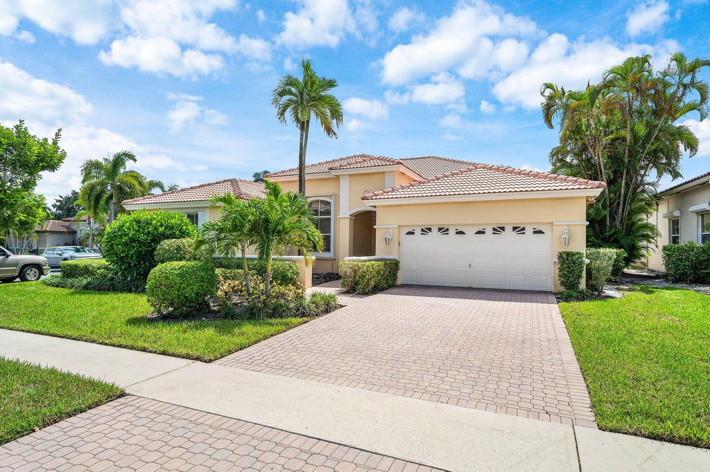 Photo of 11054 BLUE CORAL Drive, Boca Raton, FL 33498 (MLS # B26084427)