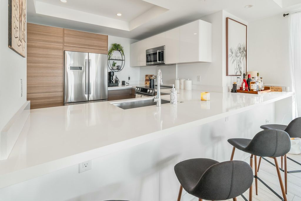 Photo of 51 SE 19th Avenue #301, Deerfield Beach, FL 33441 (MLS # R11169986)