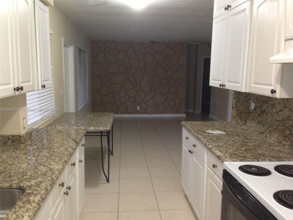 Photo of 1325 SE 1st Terrace, Deerfield Beach, FL 33441 (MLS # F10554096)