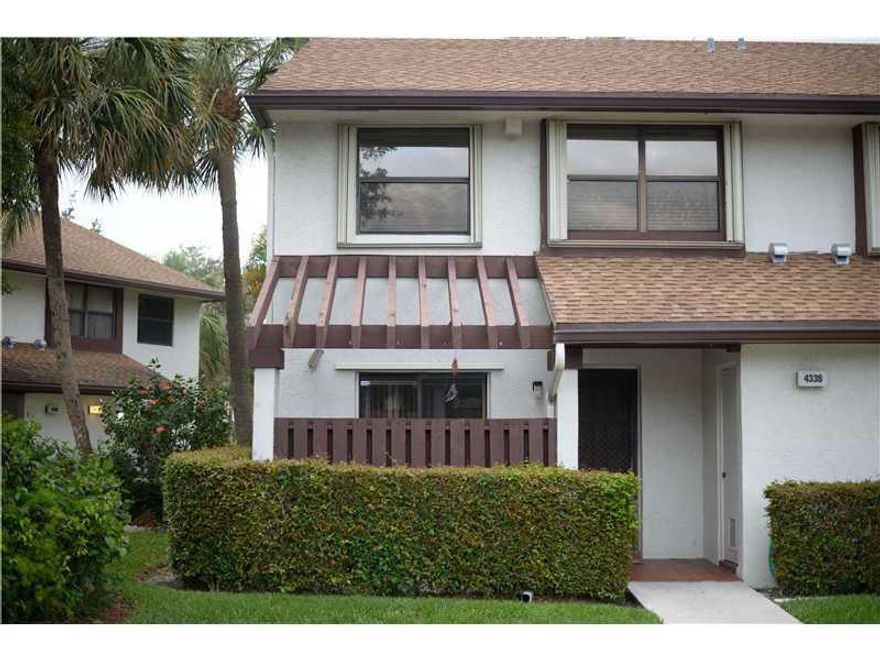 Lovely 3 bedroom/2.5 bathroom townhouse in the desirable community of Golden Raintree V in The Township! This home has been well maintained and is ready for the next owner! Features include: corner unit w/front porch & screen-enclosed patio overlooking th e lake; updated kitchen cabinets, corian countertops & stainless steel appliances; large living room; wood laminate flooring in living areas and bedrooms; vaulted ceilings and more! Hurry, don't miss it...won't last long!