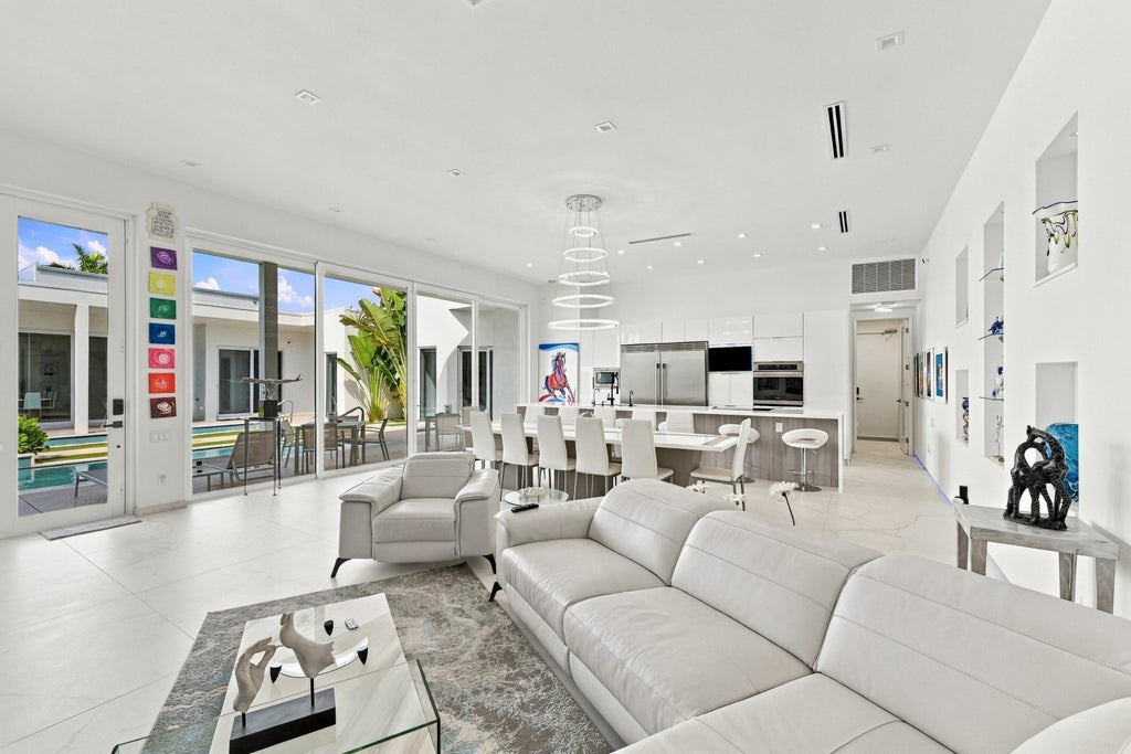Photo of 114 NE 16TH Place, Fort Lauderdale, FL 33305 (MLS # B26087428)