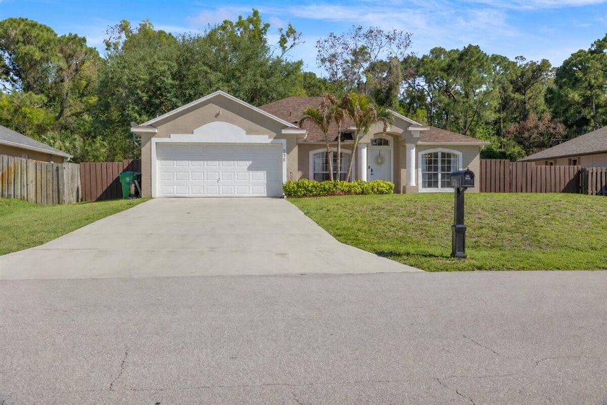 This 4/2/2 CBS split floorplan home in the heart of Port Saint Lucie is ready for its next owner.  Vaulted ceiling in the main living areas make this home feel spacious for everyday living and entertaining. Tiled throughout, no HOA, fenced yard and spacious bedrooms are a few of the standout features.  Conveniently located near near shopping, dining and major roadways. Part of the garage has been converted in a separate room for storage area BUT can be converted back to a 2 car garage. Roof (2023), WH(2022), AC(2012)
