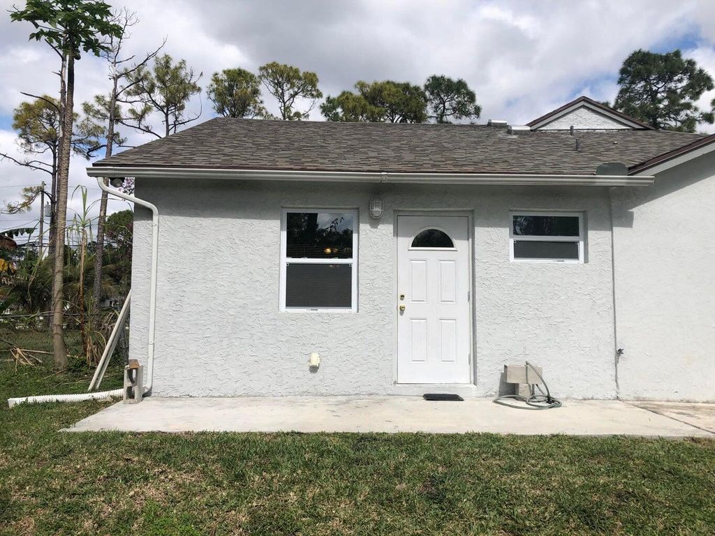 Photo of 16180 Valencia Boulevard #Efficiency, Loxahatchee, FL 33470 (MLS # R10987406)