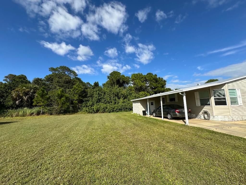 Photo of 302 Tropical Isles Circle Circle, Fort Pierce, FL 34982 (MLS # R11138534)