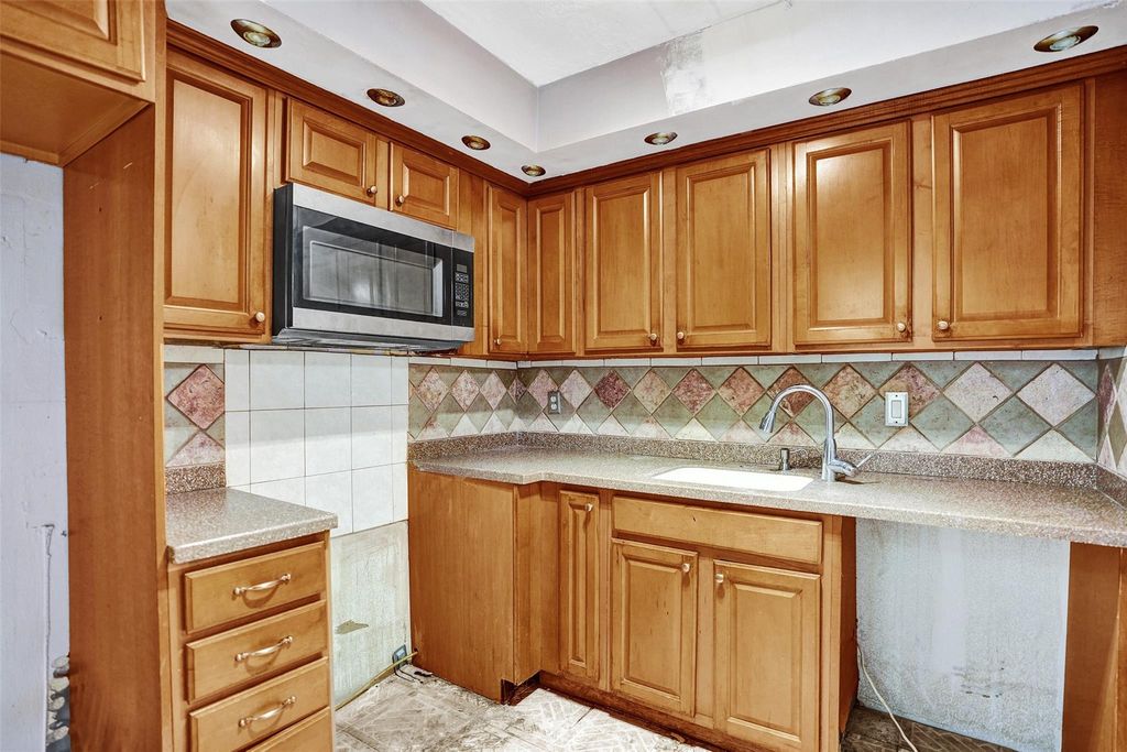 Photo of 2801 Somerset Dr #101, Lauderdale Lakes, FL 33311 (MLS # F10532960)