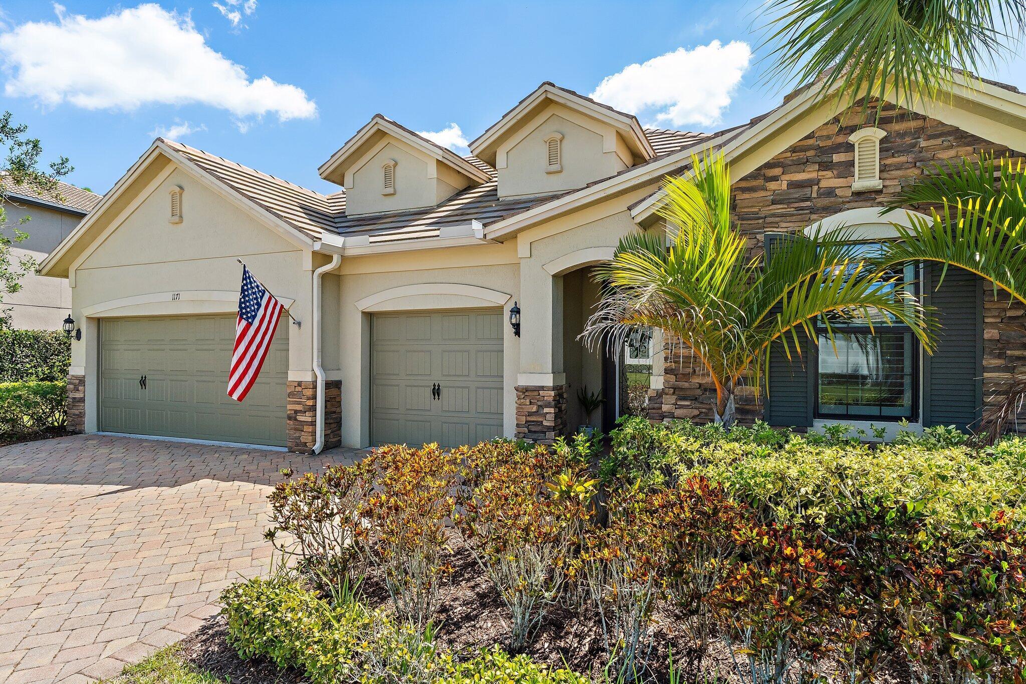 Nestled in Palm City's gated Copperleaf community, this concrete block 4 bed / 3 bath home offers contemporary style and privacy. It features a split bedroom layout, light wood-look tile, white cabinetry, stainless appliances, crown molding, and wainscoting accents. The master suite boasts a large shower and walk-in closet built-ins. Additional touches include an entryway drop zone and a bar area with refrigeration in the breakfast nook. Along with a formal dining area, the living room opens to an expansive backyard with a towering Clusia hedge providing privacy and ample room for a pool. The 3-stall garage provides plenty of room for cars and toys too! Enjoy Copperleaf's numerous amenities including a newly renovated clubhouse with fitness center, pool, tennis courts, and playground.