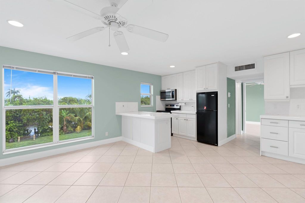 Photo of 731 Hummingbird Way #9, North Palm Beach, FL 33408 (MLS # R10939331)